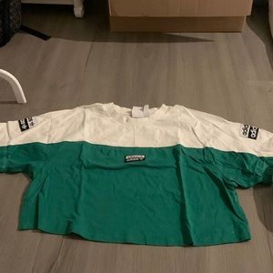 Brand: Adidas.    Color: Green/White